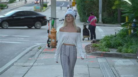 braless in public|Walking down the street braless .